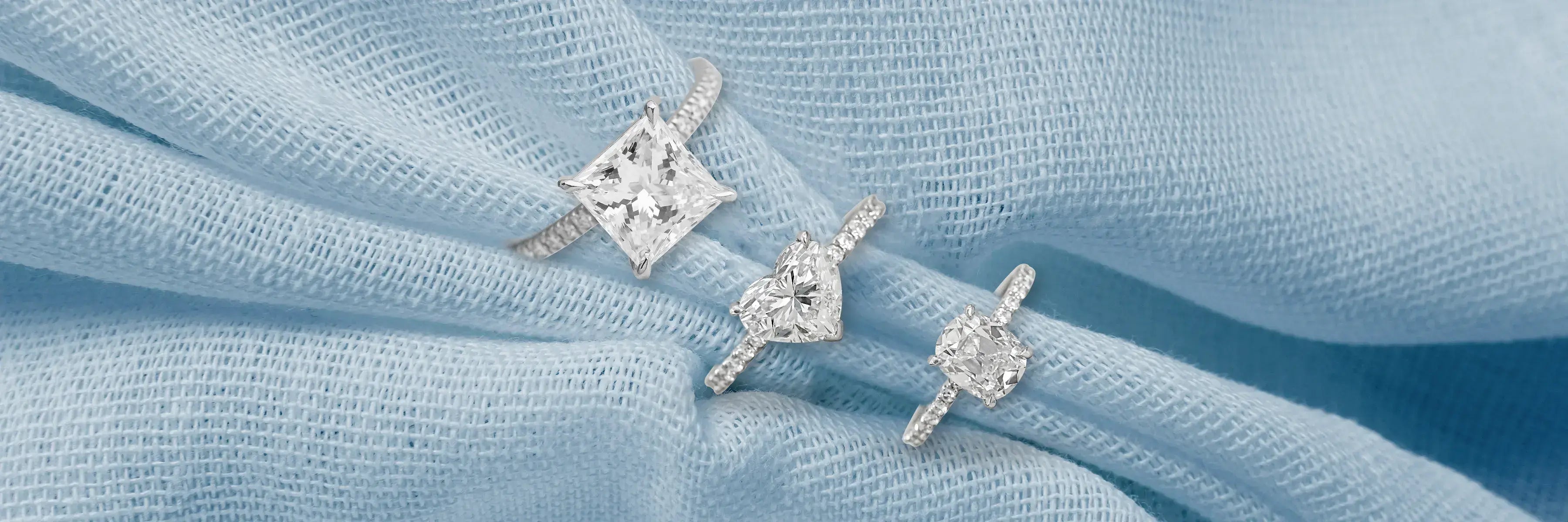Solitaire Accent Engagement Rings