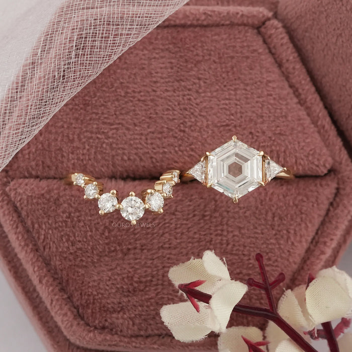 antique hexagon-cut lab diamond curved three-stone bridal ring set in jewelry box