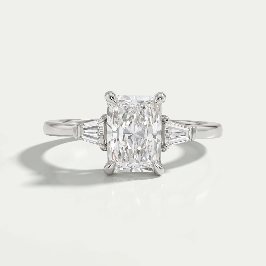 Brilliant Radiant Cut And Tapered Baguette Three stone ring Rings