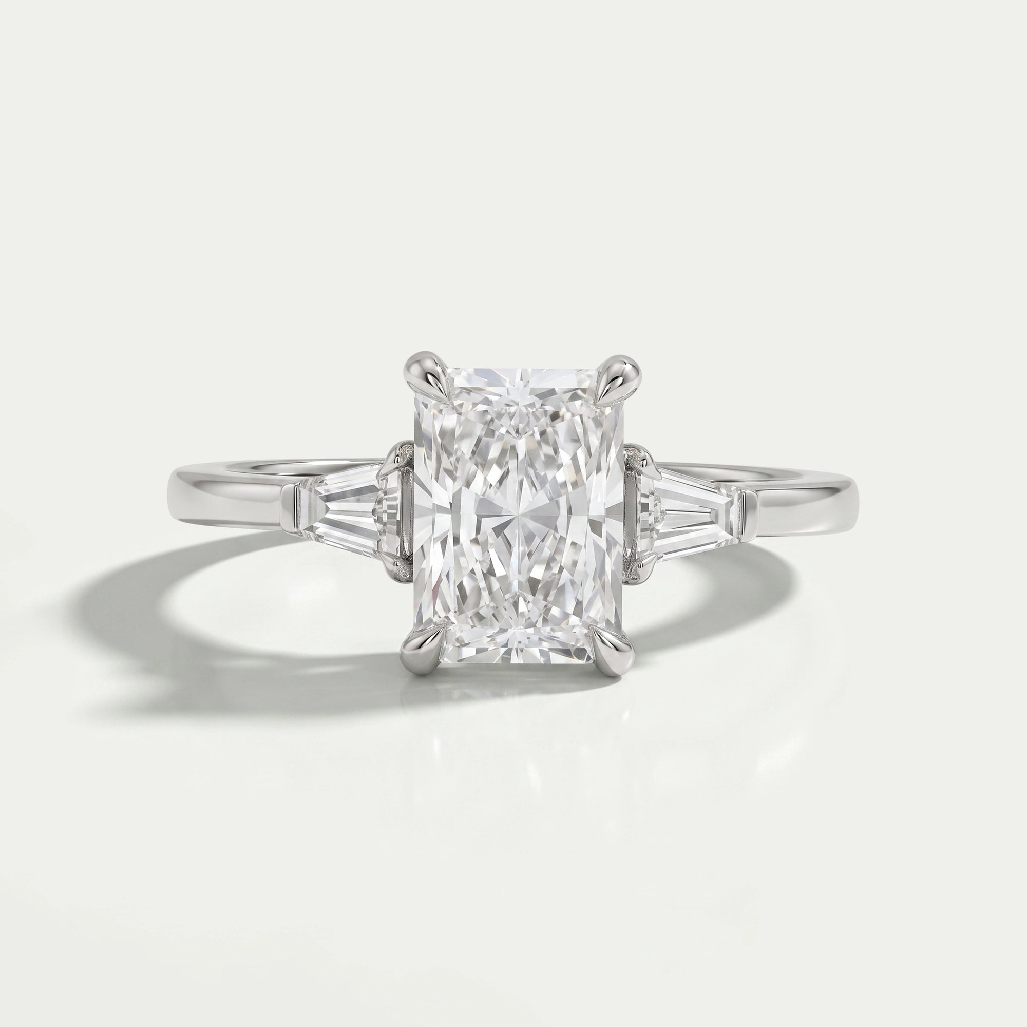 Brilliant Radiant Cut And Tapered Baguette Three stone ring Rings