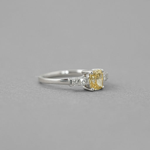 side view of canary yellow cushion-cut lab diamond 5-stone colored wedding band