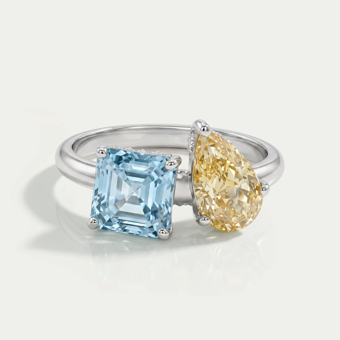 Asscher and Pear Toi Et Moi With Hidden Halo Ring Ring