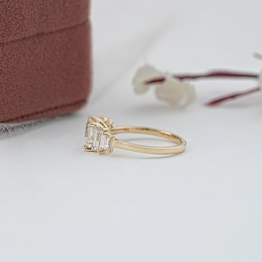 side view of asscher and baguette cut lab diamond five stone engagement ring