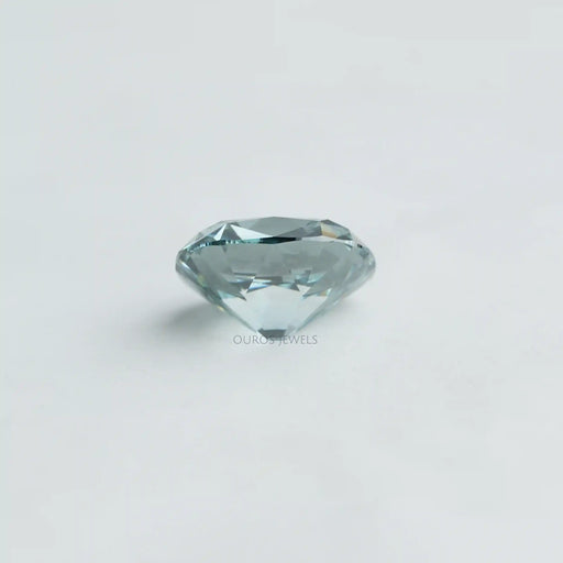 side view of fancy vivid bluish green cushion cut lab created diamond