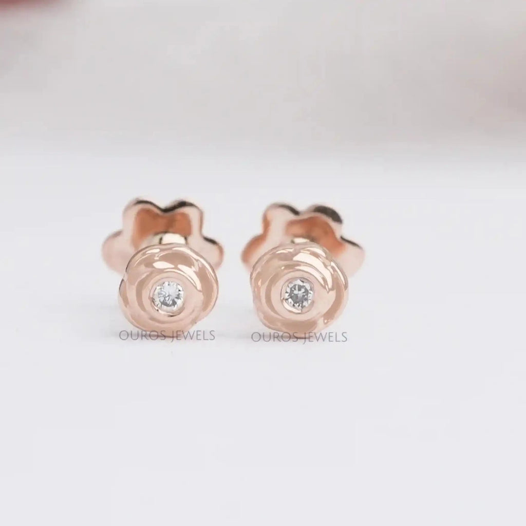 Blushing Rose Studs Earrings in rose gold featuring lab-grown diamonds at the center, displayed on a white background.