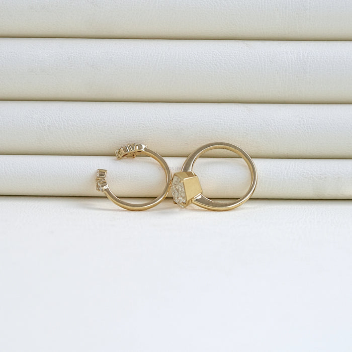 close view of dutch marquise cut lab diamond wedding ring set with yellow gold band