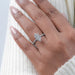 marquise-cut lab diamond solitaire hidden halo engagement ring on model's finger