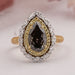 top view of on grey fabric brown pear diamond double hidden halo engagement ring