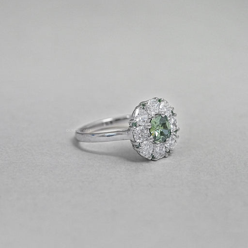 side view of green cushion cut lab diamond halo engagement ring