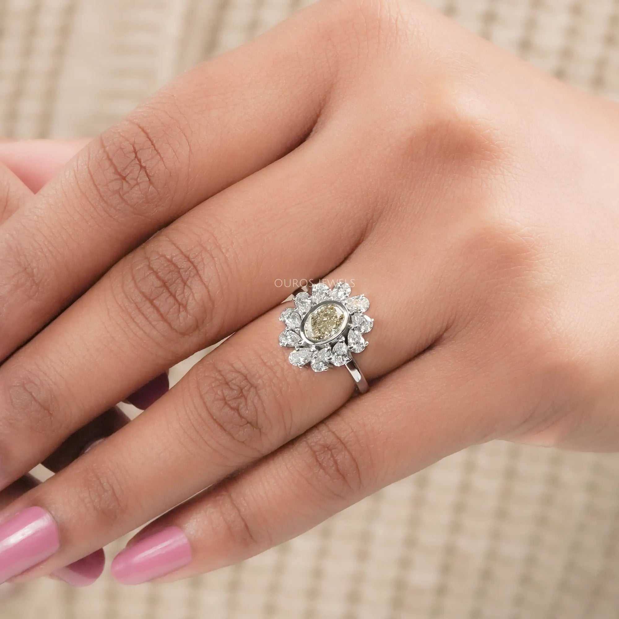 Yellow Oval Bezel Set Diamond With Pear Halo Ring