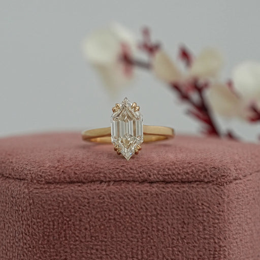 dutch marquise lab diamond 2 prong engagement ring on jewelry box