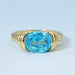 top view of east west blue oval gemstone solitaire wedding ring