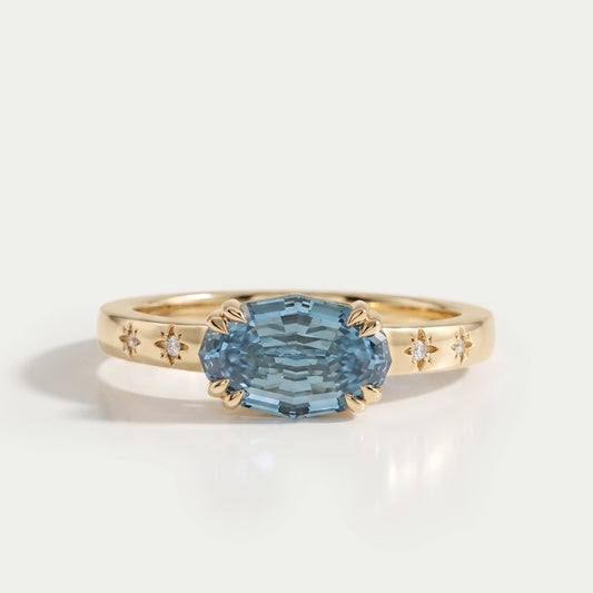East-West Blue Step Cut Oval Accent Diamond Ring Rings