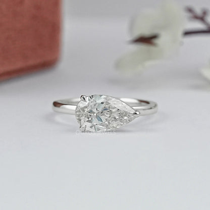 Bezel Set Pear Shaped Diamond Ring