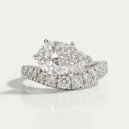 East West Pear Cut Diamond Wave Ring Ring