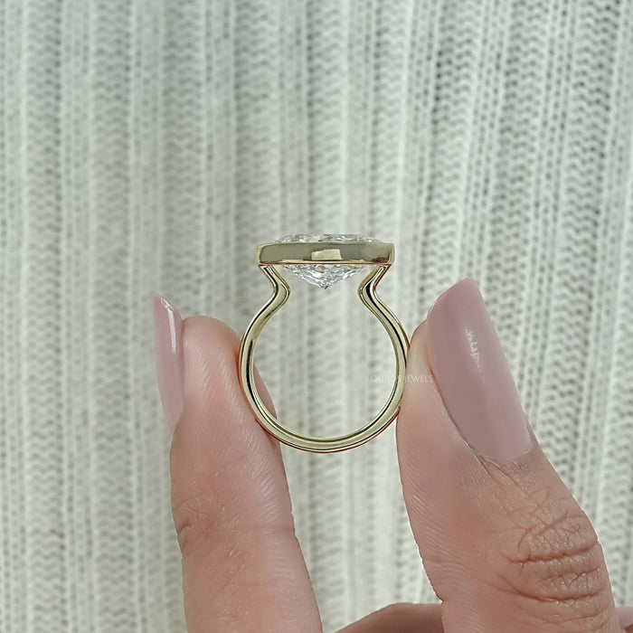 East West Portuguese Oval Bezel Set Engagement Ring