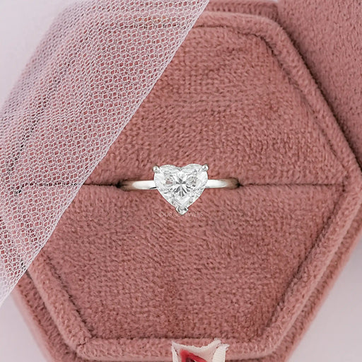 heart cut lab grown diamond solitaire proposal ring in jewelry box