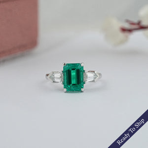 Three-Stone Emerald And Bullet Cut Diamond Ring