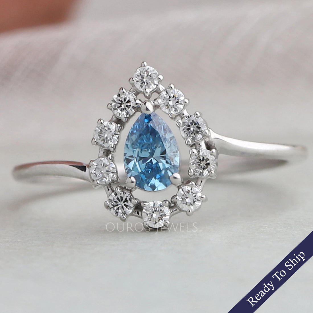Blue Pear Cut Halo Diamond Ring