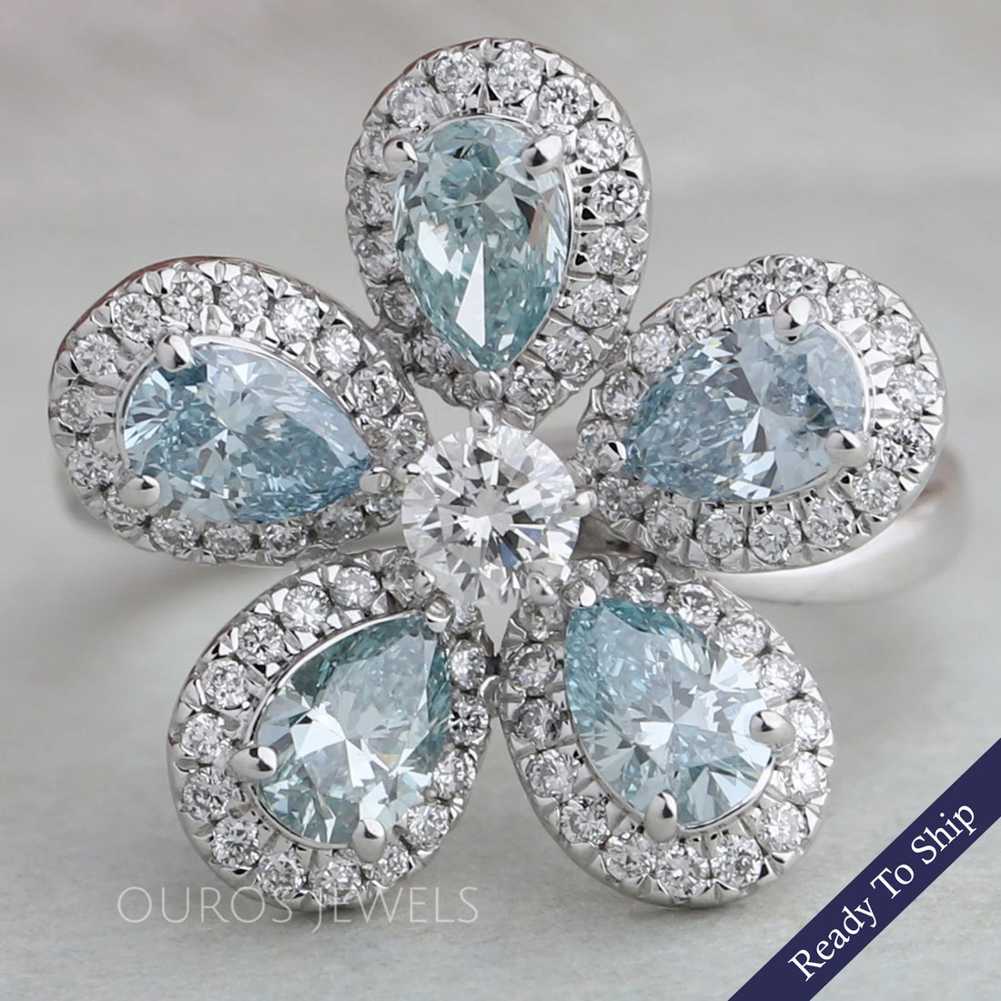 Light Blue Pear Diamond Halo Ring