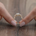 close view of elongated cushion and baguette cut diamond five stone wedding ring