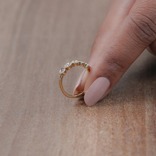 side view of five stone round cut lab diamond bezel set engagement ring