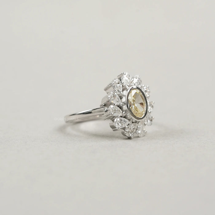 Yellow Oval Bezel Set Diamond With  Pear Halo Ring