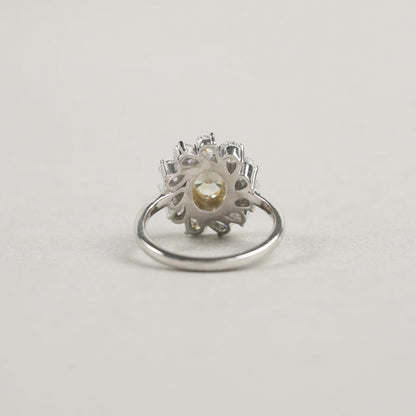 Yellow Oval Bezel Set Diamond With Pear Halo Ring