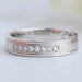 front view of 8 stone round cut diamond white gold men's wedding band