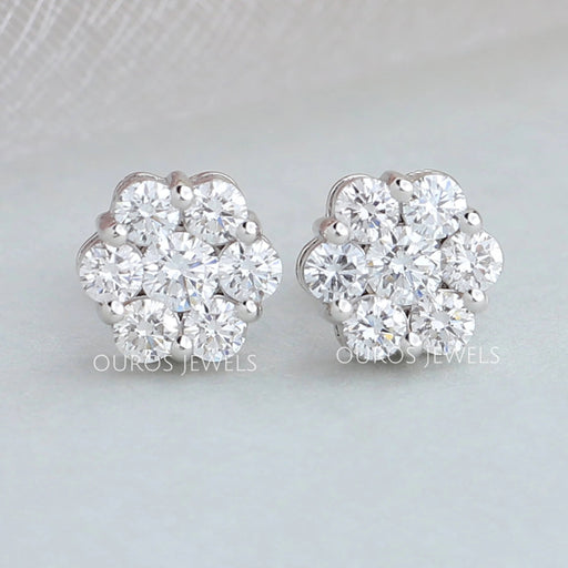 front view of floral round cut halo diamond stud earrings white gold