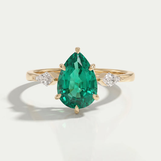 Green Pear And Kite Cut Three Stone Engagement Ring