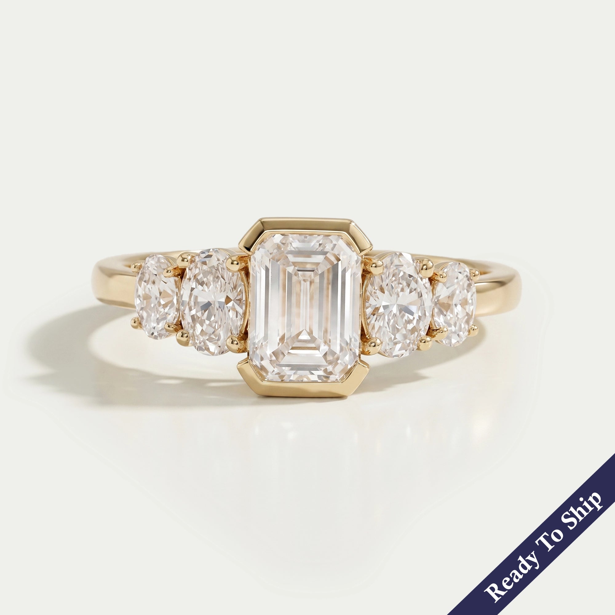 Half Bezel Emerald And Oval Five Stone Engagement Ring Rings