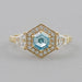 front view of blue hexagon-cut lab diamond halo 3-stone colored engagement ring
