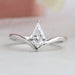 front view of kite cut diamond curved solitaire engagement ring