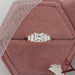 princess and baguette cut lab diamond five stone engagement ring in jewelry box