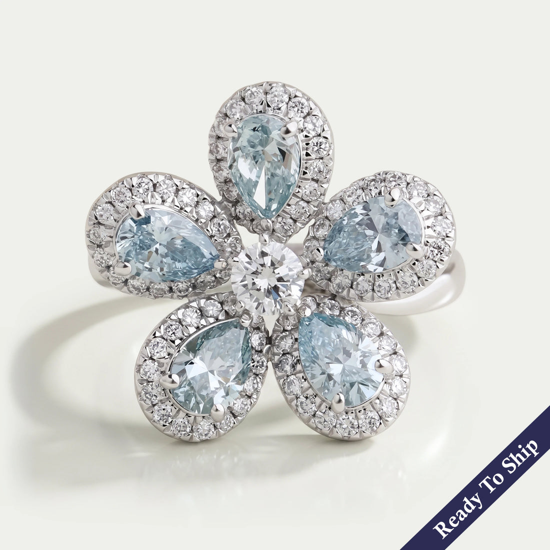 Light Blue Pear Diamond Halo Ring