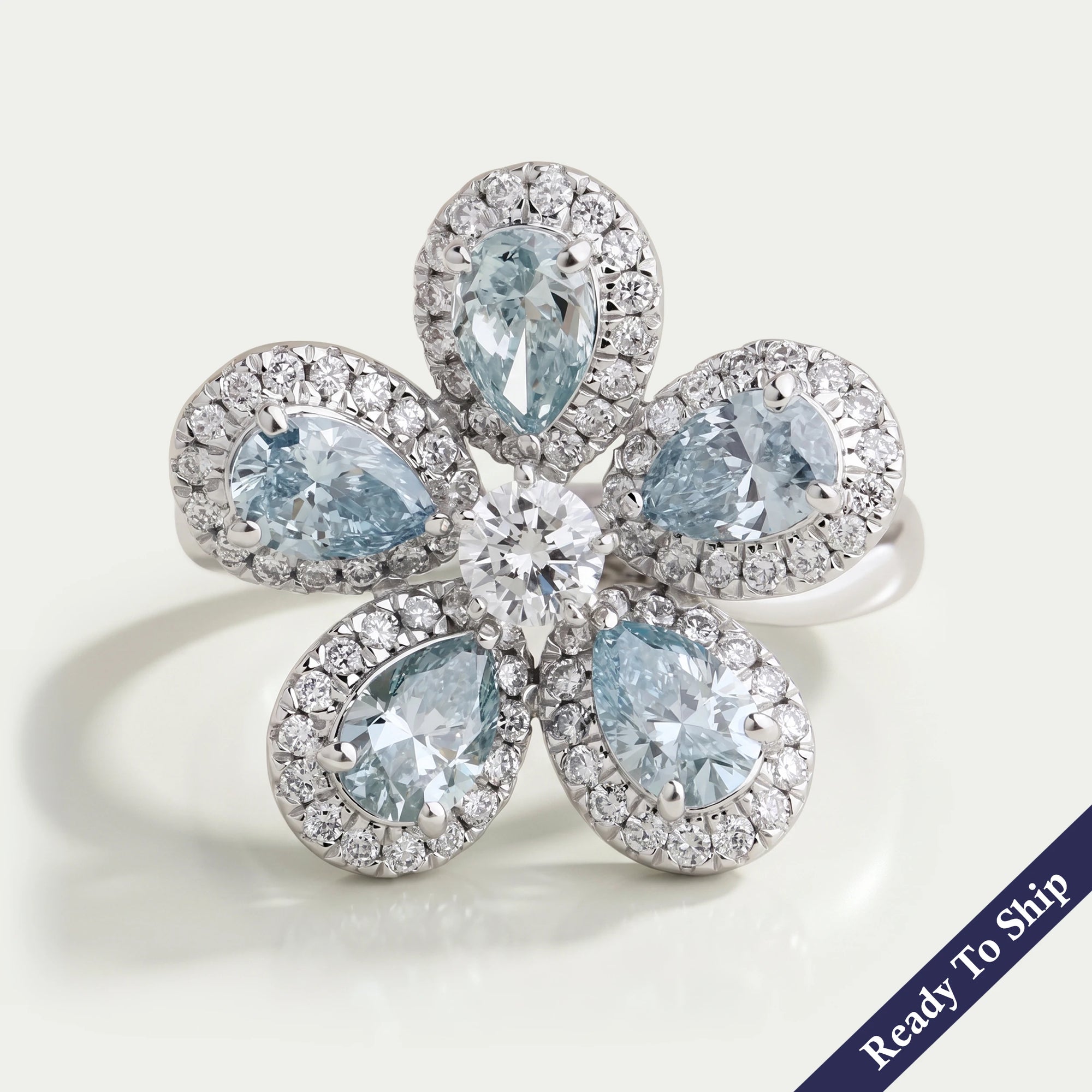 Light Blue Pear Diamond Halo Ring
