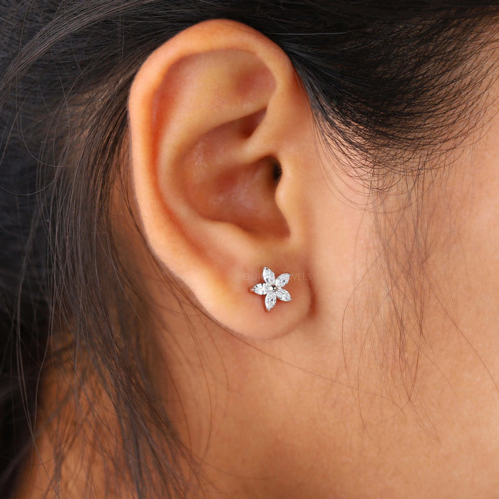 marquise cut lab made diamond flower stud earrings yellow gold on ear