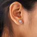 marquise cut lab made diamond flower stud earrings yellow gold on ear