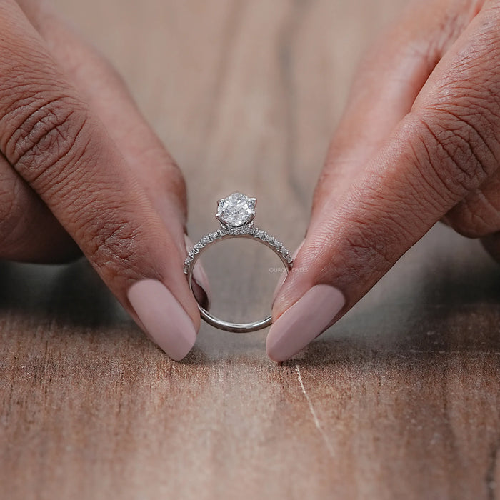 close view of marquise-cut lab diamond solitaire hidden halo engagement ring