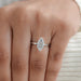 marquise cut diamond solitaire 6 prong engagement ring on model's hand