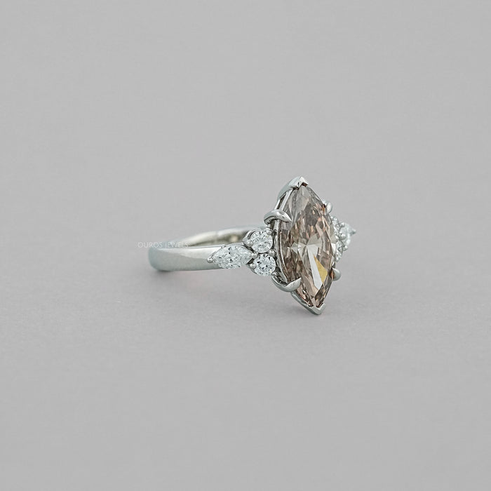side view of champagne marquise-cut lab diamond solitaire accent wedding ring