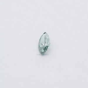 1.23 Carat Green Marquise Cut Loose Diamond showing with soft white background.