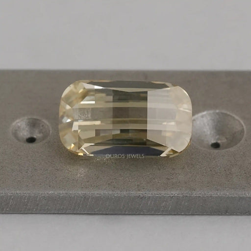yellow modified cut lab created loose diamond stone on matte material