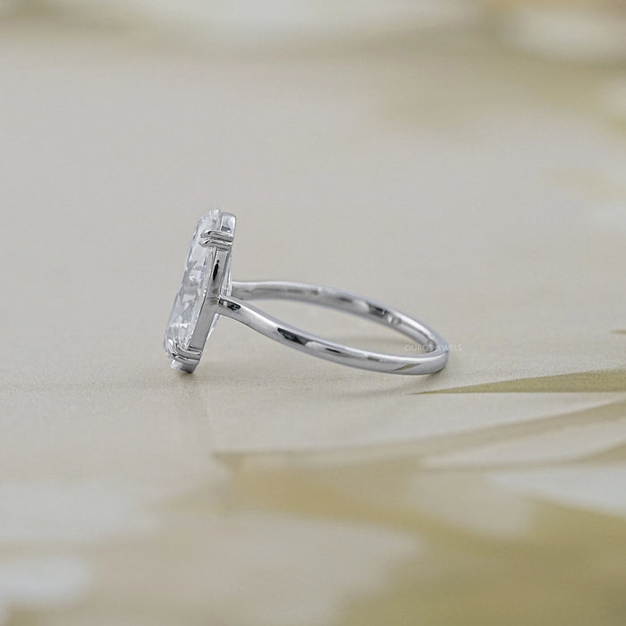 side view of old mine moval cut diamond solitaire engagement ring