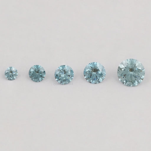 front view of blue round cut lab grown colored diamonds loose
