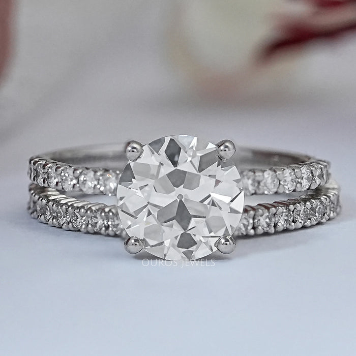 front view of old european round cut diamond bridal ring set with white gold band