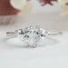 front view of heart and pear-cut lab diamond toi et moi engagement ring