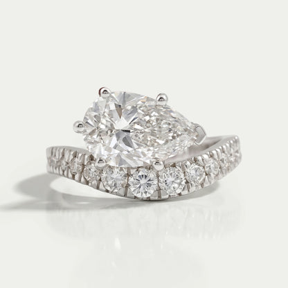 East West Pear Cut Diamond Wave Ring