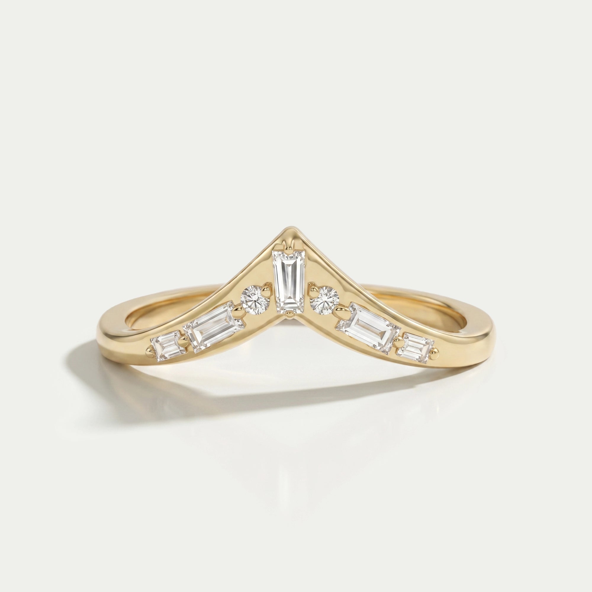 Tappered Baguette And Round Diamond Curved Band Ring